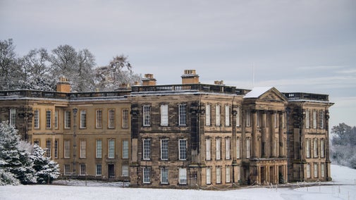 Calke Abbey, Derbyshire, in the snow, viewed from parkland